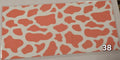 Orange Cow Print